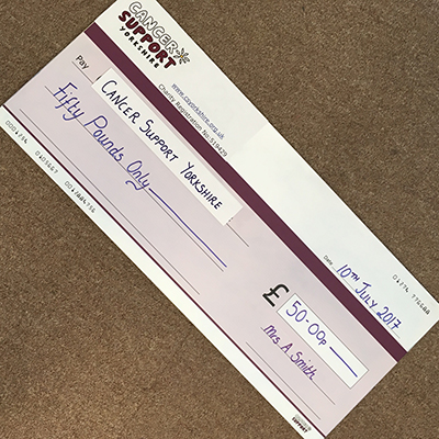 Photo of cheque donation