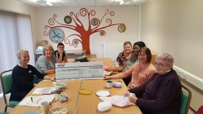 The create and chat group: Christine Stephenson, Nicole Parker, Shelley Whiteley, Angela Oldfield, Veronica Browne, Barbara Friedbach & Christine Bryant, with a cheque for £1000.00 for Cancer Support Yorkshire!